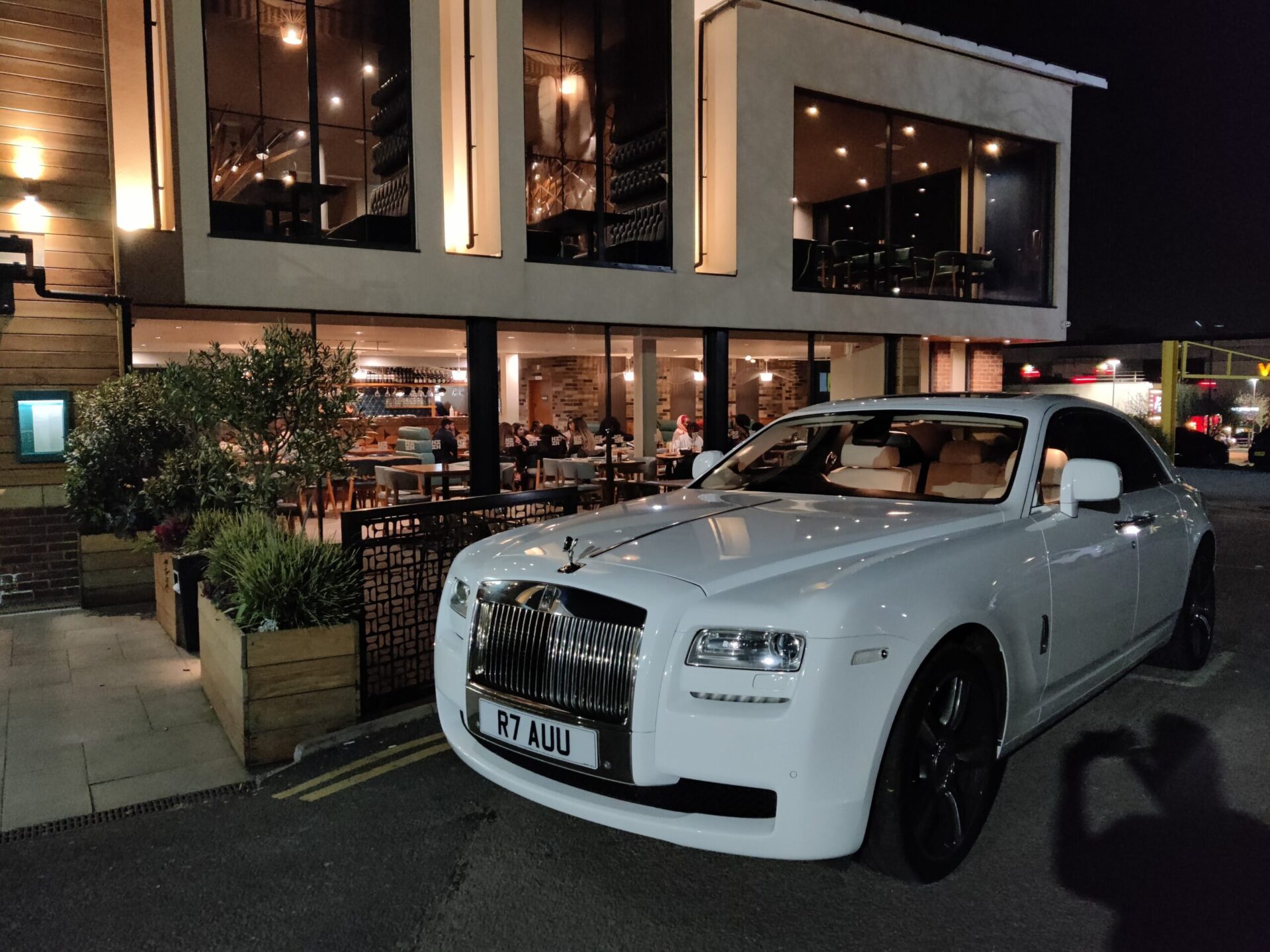 Morgan Stallion offering transportation services to a busy restaurant in London